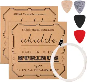 2 Sets von Nylon Ukulele Saiten mit 4 Filz Picks, Saiten sind Weiß, Picks sind G